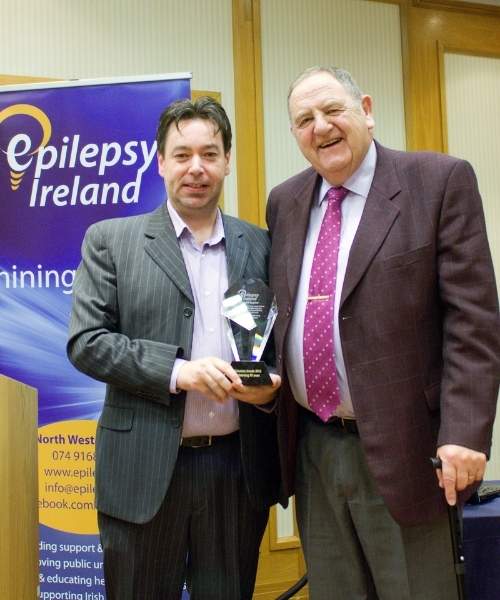 Bernard Hughes pictured with Epilepsy Ireland CEO, Peter Murphy, receiving his Volunteer of the year award in 2016