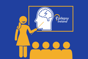 Image of teacher showing a class brain with Epilepsy Ireland Logo