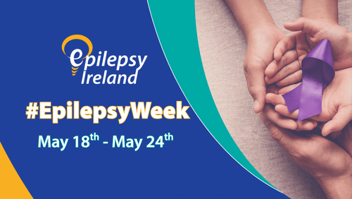#Epilepsy Week in yellow lettering with date of May 18th - 24th underneath and image of hands holding a purple ribbon to the RHS