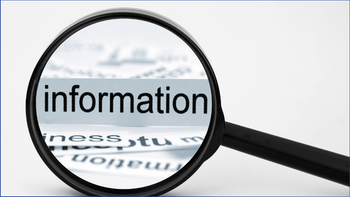 Magnifying glass with the word information in it