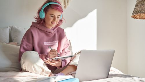 Girl looking at laptop