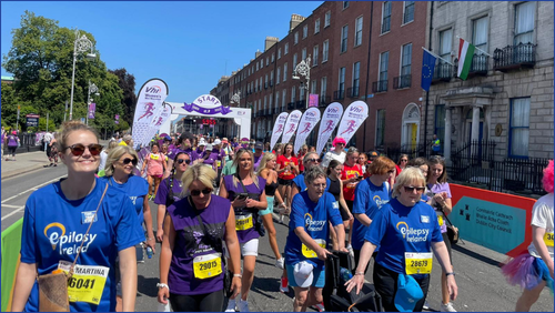 Group of marathon participants leaving the start line