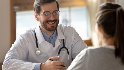 Doctor talking to their patient.