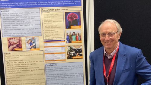 Dr. Henry Smithson with poster about study at International Epilepsy Congress
