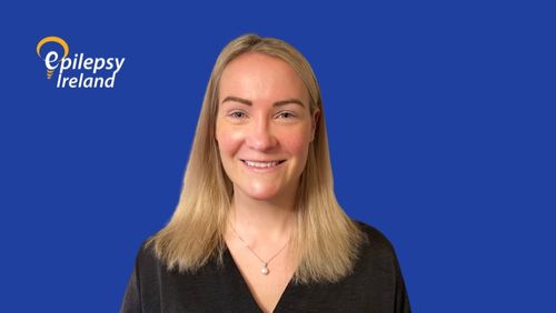 Joanne Lynch with blue background and Epilepsy Ireland Logo in Left hand side corner