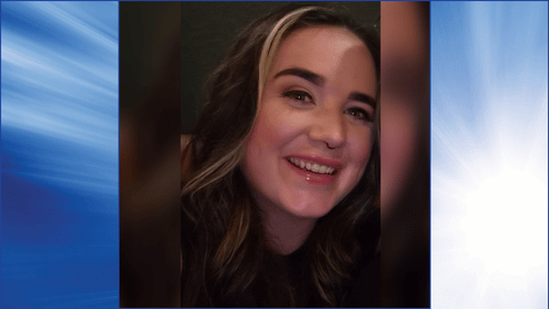 Picture of Lauren on a blue background