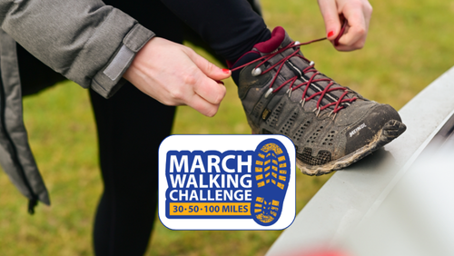 Person tying shoelace