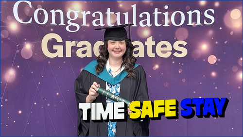 Girl with dark hair graduating from ATU