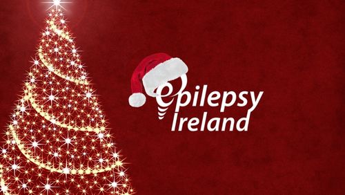 Christmas Tree and Epilepsy Ireland Logo with a Santa Hat on the E with red background.