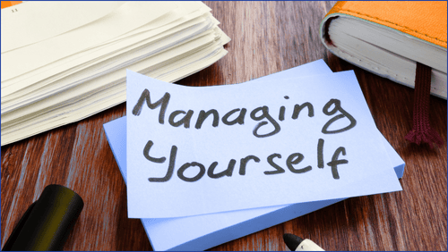Postit note with managing yourself written on it