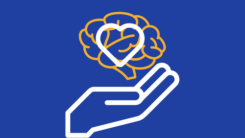 Hand showing putting love heart over a brain