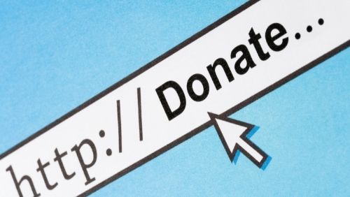 Mouse clicking on website link with word "donate"