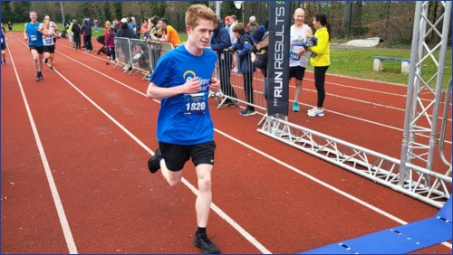 Joar crossing the finishing line at the Dunboyne 10k