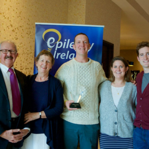 Mark Early and family members receiving award