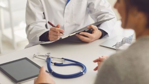 Image of a patient in consultation with a  Doctor