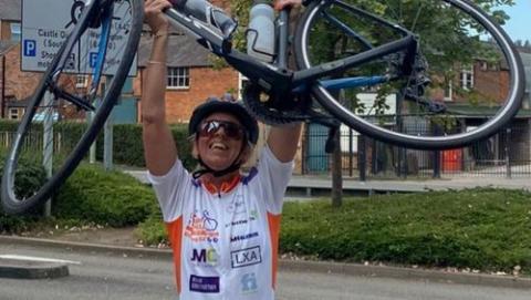 Shane's mother Margaret Corrigan celebrating a milestone during the cycle