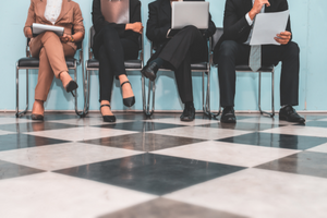 Image of people awaiting job interview