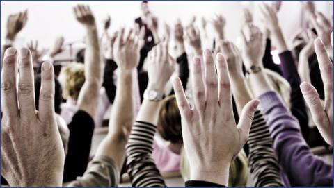 Hands being raised