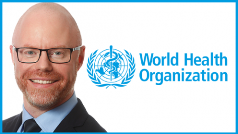 Minister Stephen Donnelly and World Health Organisation Logo