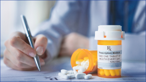 Doctor writing prescription