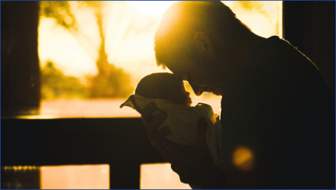 Man holding baby