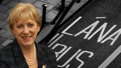 Minister Heather Humphreys and background of Bus Lane