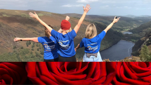 Three Epilepsy Ireland volunteers overlooking mountain pass & Rose Footer