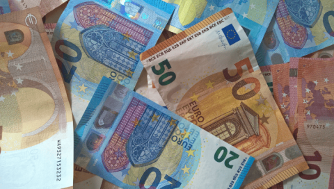A pile of twenty euro and fifty euro notes